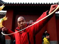 A Man Blows Sugar Figurines in Beijing