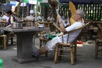 People Enjoy Their Time in Chengdu Teahouses