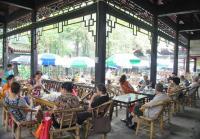 People Rest and Enjoy Themselves in a Chengdu Teahouse