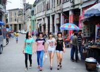The Local Girls Walking on a Street in Chikan Town
