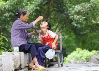 A Grandma and Her Grandson at Huangyao Ancient Town