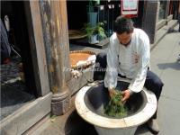 A Man is Making Tea in Chengdu Jinli Ancient Street