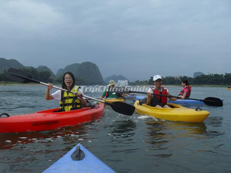 Tourists Enjoy Kayaking in Li River