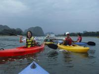 Tourists Enjoy Kayaking in Li River