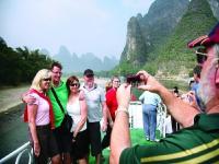 Tourists Enjoy Their Li River Cruise Trip