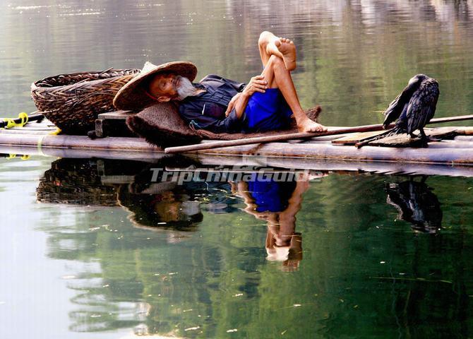 An Old Fisherman Sleeping on the Li River Guilin