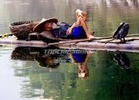 An Old Fisherman Sleeping on the Li River Guilin 