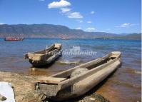 The pig-trough boats of Mosuo People in Lugu Lake