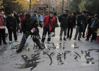 A Man Writing Calligraphy at People's Park Chengdu