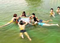 Chengdu Young People Playing Mahjong in Water 