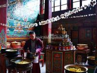 A Lama Prepares Food for Lunch in Shouling Temple