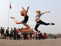 Two Girlds Are Posing in Tiananmen Square