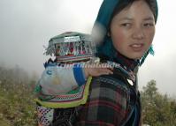 Hani Village Woman and Her Baby at Laohuzui of Yuanyang County, Yunnan, China