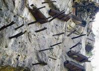 The Ancient Hanging Coffins on the Cliffs along the Nine-bend Strem in Wuyi Mountain