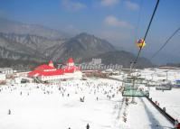 Young women sliding down the slope, Xiling Ski Resort, Xiling Snow Mountain,  Dayi County, Sichuan Province, China Stock Photo - Alamy