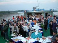 Tourists Enjoy Banquet on A Yangtze Cruise Ship